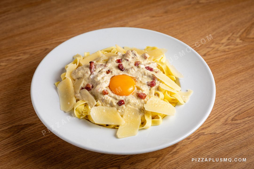 Tagliatelle carbonara with egg yolk